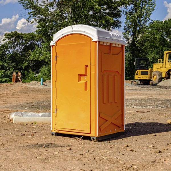 how often are the portable restrooms cleaned and serviced during a rental period in Arcada Michigan